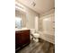 Full bathroom with a combination tub/shower, modern vanity, and neutral decor at 2533 Piering Dr, Lithonia, GA 30038