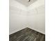 Spacious walk-in closet with corner shelving for organized storage at 2533 Piering Dr, Lithonia, GA 30038