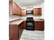 Kitchen with modern appliances, countertop space and wood cabinets for cooking at 2533 Piering Dr, Lithonia, GA 30038