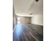 Open living room featuring hardwood floors and ceiling fan; ready for personal touches at 2533 Piering Dr, Lithonia, GA 30038