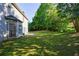 The home's spacious backyard offers lots of space with plenty of room for activities and entertaining at 2687 Mountain Oaks Ct, Powder Springs, GA 30127