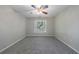 Bedroom featuring new carpet, a ceiling fan, and a window at 2687 Mountain Oaks Ct, Powder Springs, GA 30127