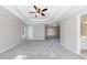 A large bedroom showing windows and a nice ceiling fan at 2687 Mountain Oaks Ct, Powder Springs, GA 30127