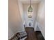 Two-story foyer with chandelier, stairs, and dark hardwood flooring at 2687 Mountain Oaks Ct, Powder Springs, GA 30127