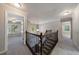 A view of an upstairs hallway with carpet and nice railing to the staircase at 2687 Mountain Oaks Ct, Powder Springs, GA 30127