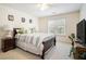 Bedroom featuring carpet, bed and natural lighting at 725 Windsor Place Sw Cir, Grayson, GA 30017
