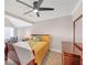Comfortable bedroom with a ceiling fan and a classic furniture set at 328 Broadmoor Way, Mcdonough, GA 30253