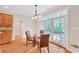 Bright breakfast nook with a glass table and french doors leading to the outdoor patio at 328 Broadmoor Way, Mcdonough, GA 30253