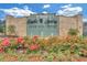 A welcome sign at Eagle's Landing Country Club Community, surrounded by beautiful flowers at 328 Broadmoor Way, Mcdonough, GA 30253