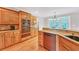 Spacious kitchen featuring granite countertops and wooden cabinetry at 328 Broadmoor Way, Mcdonough, GA 30253