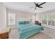 Serene main bedroom with carpet, neutral colors, and oversized windows at 328 Broadmoor Way, Mcdonough, GA 30253