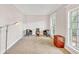 Cozy sitting area with natural light from large windows at 328 Broadmoor Way, Mcdonough, GA 30253