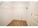 Walk-in closet with wire shelving for organized storage, carpet flooring, and white walls at 4750 Sabino Bnd, Cumming, GA 30040