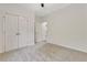 Bedroom with double door closet and carpeted floor at 60 Wheeler Lake Path, Dallas, GA 30157