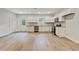 Eat-in kitchen featuring stainless steel appliances, granite countertops, and hardwood floors at 60 Wheeler Lake Path, Dallas, GA 30157