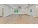 Bright living space featuring hardwood floors, and views of the outdoors at 60 Wheeler Lake Path, Dallas, GA 30157