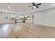 Spacious living room with an open floor plan, modern fixtures, and an adjacent kitchen at 60 Wheeler Lake Path, Dallas, GA 30157
