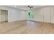 Bright living space featuring hardwood floors, a ceiling fan, and plenty of natural light at 60 Wheeler Lake Path, Dallas, GA 30157