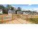 View from the back deck showcasing neighborhood homes in a tranquil community setting at 1316 Village Brook Dr, Dacula, GA 30019