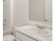 Bright bathroom featuring a vanity with a marble countertop at 1316 Village Brook Drive, Dacula, GA 30019