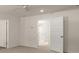 Spacious bedroom with ample closet space and neutral decor, offering a blank canvas for personalization at 1316 Village Brook Drive, Dacula, GA 30019