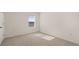 Bright bedroom with white walls and neutral carpet at 1316 Village Brook Drive, Dacula, GA 30019