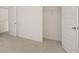 Bedroom featuring carpet and a walk-in closet at 1316 Village Brook Drive, Dacula, GA 30019