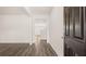 Welcoming entryway with hardwood floors, leading into a bright and open living space at 1316 Village Brook Drive, Dacula, GA 30019