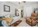 Bedroom with a ceiling fan, carpet, and natural light, plus ensuite access at 2000 Suttles Sw Dr, Atlanta, GA 30331