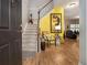 Welcoming foyer with hardwood floors and staircase leading to the upper level at 2000 Suttles Sw Dr, Atlanta, GA 30331