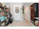 Hallway with carpet, bookshelves, and neutral colored walls with decor at 2000 Suttles Sw Dr, Atlanta, GA 30331