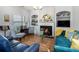 Cozy living room with a fireplace and built-in shelving at 2000 Suttles Sw Dr, Atlanta, GA 30331