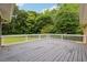 Enjoy the view from this well-maintained wooden deck, perfect for outdoor entertaining at 4125 Hickory Dr, Powder Springs, GA 30127