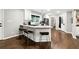 Modern kitchen boasts granite counters, black appliances and a breakfast bar with seating at 4125 Hickory Dr, Powder Springs, GA 30127