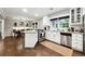 Stylish kitchen with granite counters, stainless steel appliances, and an island with seating at 4125 Hickory Dr, Powder Springs, GA 30127