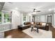 Cozy living room with hardwood floors, a neutral color palette, and large windows at 4125 Hickory Dr, Powder Springs, GA 30127