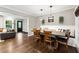 Cozy dining area transitions to a living area creating an inviting and open layout at 4125 Hickory Dr, Powder Springs, GA 30127