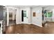 The living area features hardwood floors, access to a patio, and transitions to a dining area at 4125 Hickory Dr, Powder Springs, GA 30127