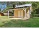 The storage shed is well-maintained, offering additional space for outdoor equipment and tools at 4125 Hickory Dr, Powder Springs, GA 30127