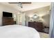 Bedroom showcasing warm gray walls, wood furniture and hardwood flooring at 4128 Morgan Rd, Tucker, GA 30084