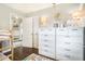 bedroom featuring a bunk bed and ample storage space with white dressers at 4128 Morgan Rd, Tucker, GA 30084