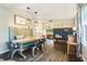 Open-concept dining area connecting to a cozy living room and modern kitchen at 4128 Morgan Rd, Tucker, GA 30084