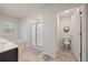 Bathroom featuring a tub/shower combination, a toilet, and a sink with dark cabinets at 4827 Golden Finch Ln, Powder Springs, GA 30127