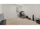 Bedroom featuring a desk, rolling office chair, and a computer workstation at 4827 Golden Finch Ln, Powder Springs, GA 30127