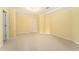 Spacious basement featuring carpet and a white door at 5215 Tealing Ne Dr, Roswell, GA 30075