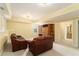 Finished basement with soft carpet, leather furniture, and lots of space at 5215 Tealing Ne Dr, Roswell, GA 30075