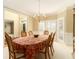 Formal dining room featuring a chandelier, chair railing, and lots of light at 5215 Tealing Ne Dr, Roswell, GA 30075