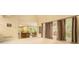 Expansive living room featuring large windows, neutral carpet, and views into kitchen at 5215 Tealing Ne Dr, Roswell, GA 30075
