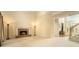 Spacious living room with a fireplace, high ceilings, and an open layout at 5215 Tealing Ne Dr, Roswell, GA 30075