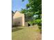 View of home's backyard featuring green grass and privacy fencing at 11813 Lovejoy Crossing Blvd, Hampton, GA 30228